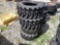Four Unused 12-16.5 Skid Steer Tires