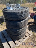 Four Used Tires and Wheels