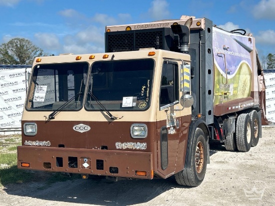 2012 Crane Carrier Co. Low Entry T/A Loadmaster Rear Loader Garbage Truck