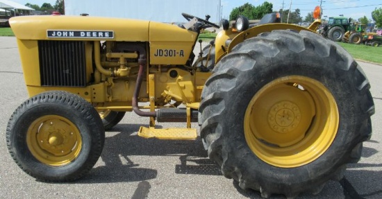 John Deere model JD301-A wide front gas tractor with 3 pt/pto. Note: Runs a