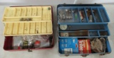 (2) Tackle boxes with various contents.