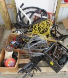Contents of pallet including hoses, Ryobi pressure washer wand, horse tac,