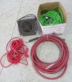 Assortment of power cords, air hose and heater blower.