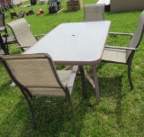 Patio table with (4) chairs.
