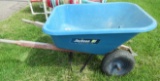 Jackson wheel barrel. Note: Tires are flat and have cracks.