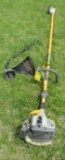 Ryobi SS26 straight shaft gas tree trimmer and weed whip attachment.