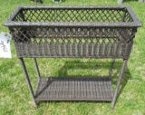 Wicker two tier plant stand. Measures 28