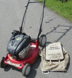 Snapper 6.75HP gas push mower. Note: Pulls free.