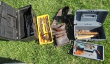 Tool boxes with various hand tools including ratchets, sockets, hammers, et