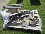 Pallet of various concrete tools.