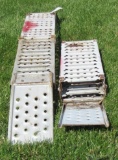 Pair of metal folding lawn mower ramps.