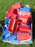 Assortment of plastic organizer bins.