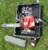 Homelite 4218C gas chainsaw. Note: Pulls free.