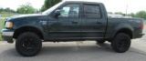 2001 Ford F150 Super Crew truck with 5.4 V8 engine, automatic transmission,