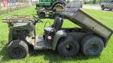 John Deere 6X4 diesel military Gator with 975 hours and electric dump box.