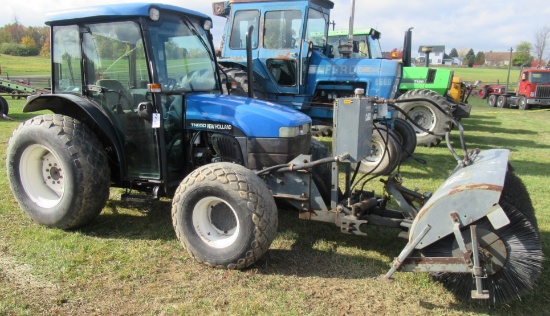 New Holland TN650 with Cab & Sweepster Sweeper Attachment.