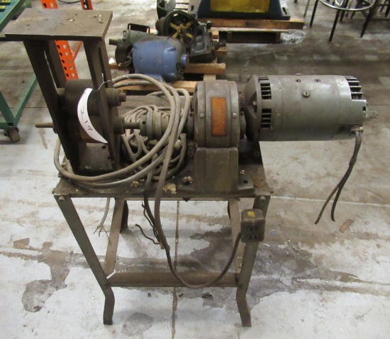Home Made Steel Roller On Stand. Measures 49" H X 32" W X 17" D.