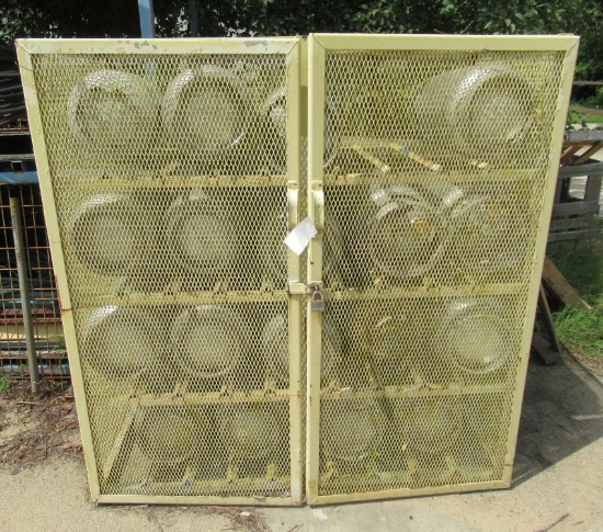 Propane Locking Metal Locker with tanks. Measures 64" H X 64" W X 33 1/2" D.