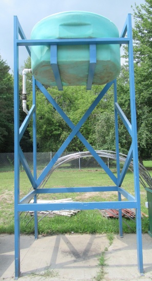 Homemade Water Tower. Measures 14' H X 6 'w X 5' D.