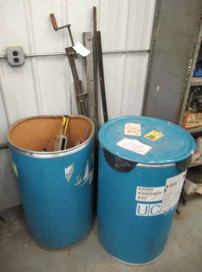 Group That Includes Pipe Clamp, Minisafe-b And Almost Full Barrel Of Glass