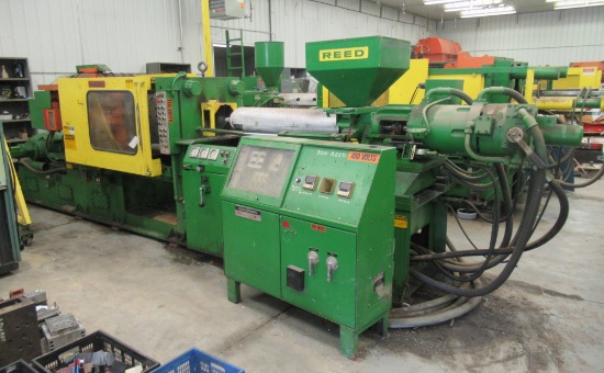 Reed Model 300 T5 Injection Molding Machine. Measures Approx. 29' Long. Pic