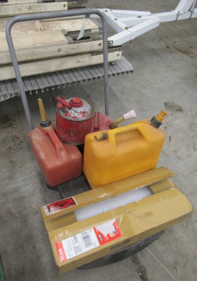 Rolling Plastic Shop Cart With Fuel Cans And Poly Bags.