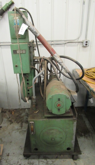 Heavy-duty Hydraulic Pump. Measures 68" Tall.