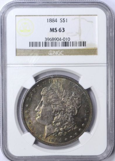 1884 MORGAN DOLLAR - NGC MS63 - TONED