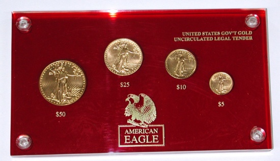 1986 FOUR-COIN GOLD EAGLE SET in HOLDER - 1.85 TROY OUNCES TOTAL