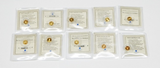 TEN .5 GRAM 14k GOLD COINS in HOLDERS