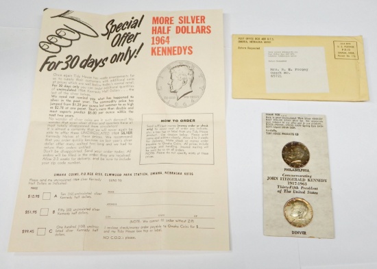 TWO (2) 1964 KENNEDY HALVES in ORIGINAL TIDY HOUSE HOLDER with ORIGINAL ENVELOPE & BROCHURE