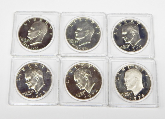 SIX (6) CLAD PROOF EISENHOWER DOLLARS in PLASTIC HOLDERS