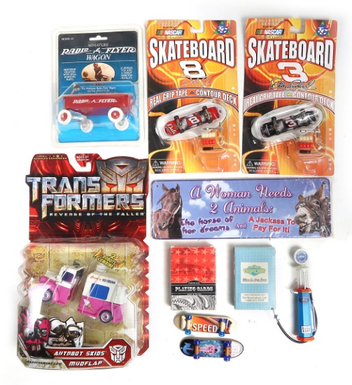 Toys & Novelties (10), mostly new in packages incl. Nascar skateboards, Tra