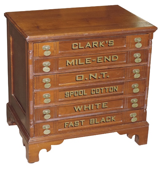 Spool Cabinet, Clark's Mile-End, walnut 6-drawer raised on scrolled bracket