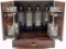 An MCM Wood Cased Bar Set