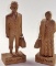 A Pair of Hand Carved Wood Immigrant Figures