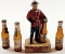 A Drewry's Beer Advertising Figure & 3 Pabst Bottles