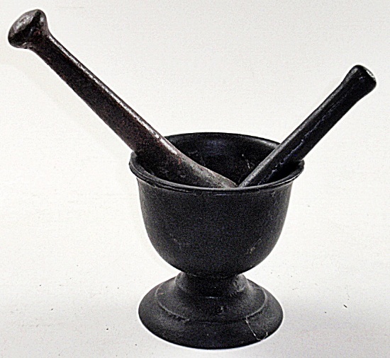 A Cast Iron Mortar & 2 Pestles