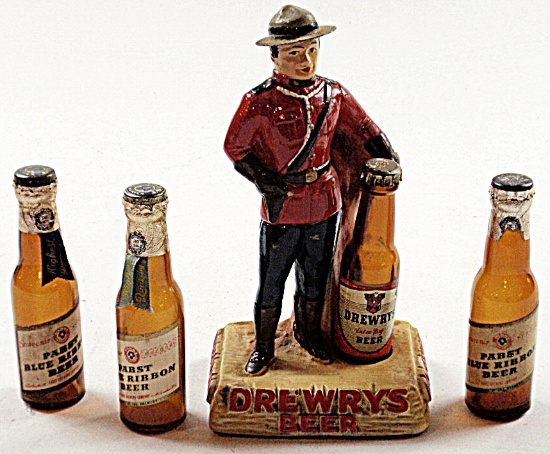 A Drewry's Beer Advertising Figure & 3 Pabst Bottles