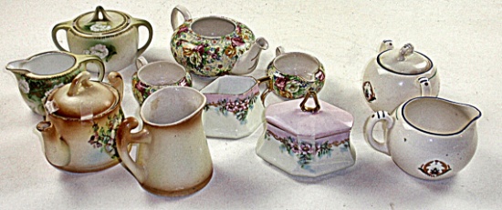 11 Pc Porcelain Tea Pots, Creamers & Sugars