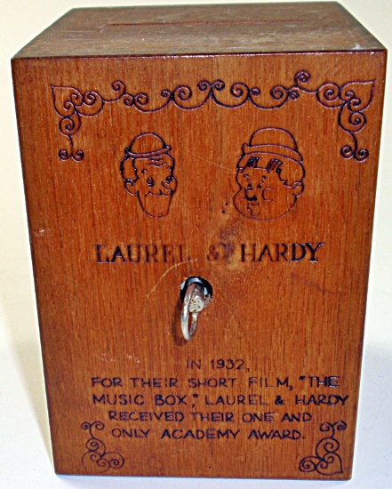 A Laurel & Hardy Pyrography wood music box/bank, Exc working cond 1978 by T