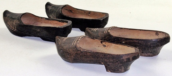 2 pairs of hand carved wooden shoes