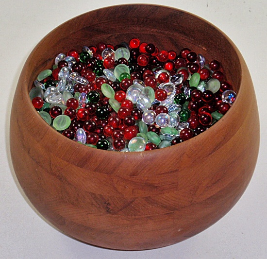A Large Dansk Wooden Bowl full of colored glass