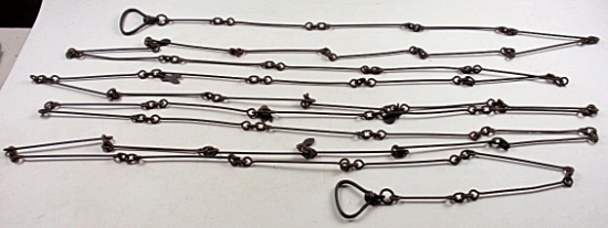 A Gunter's Or Surveyors Chain, with stirrup handles and each end.