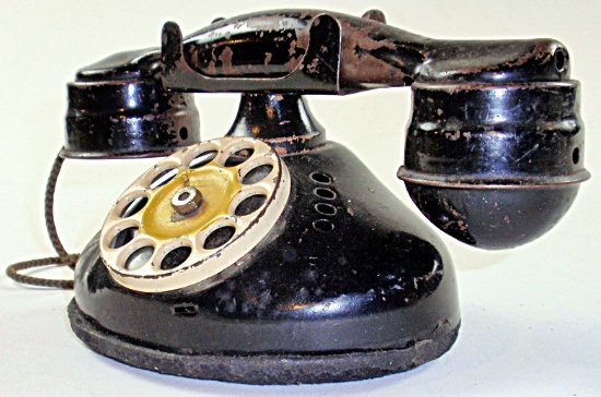 A Toy Pressed Tin Telephone.