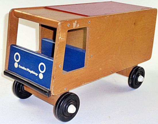 A Wood "Ride-On" Vehicle Toy Box