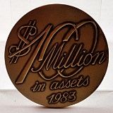 A John Deere $1 Million Bronze Medallion