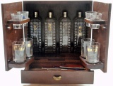 An MCM Wood Cased Bar Set