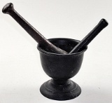 A Cast Iron Mortar & 2 Pestles