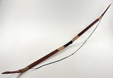 A Carved Wood Recurve Bow